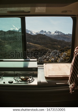 Campervan kitchen in the mountains outdoors 