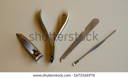 Close up of the nail clipper equipment on the table