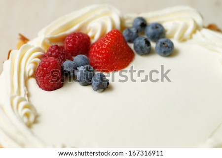 Cake with cream and berries
