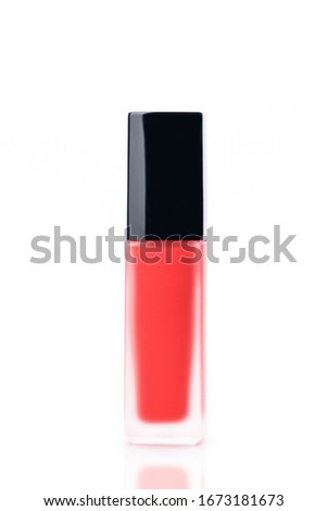 Red lipstick isolated on a white background. Promotion of luxury fashion cosmetic brand. The concept of fashion and beauty. Fashion blog design