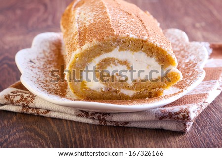 Roulade with cream cheese filling, selective focus