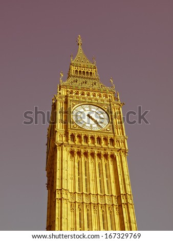 Vintage look Big Ben Houses of Parliament Westminster Palace London gothic architecture - over blue sky background