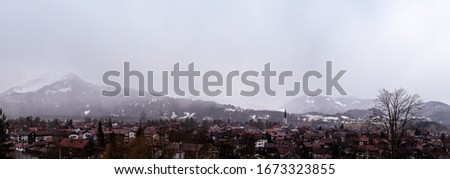 Panoramic picture of the Oberstdorf on a foggy winter day in upper Allgäu.