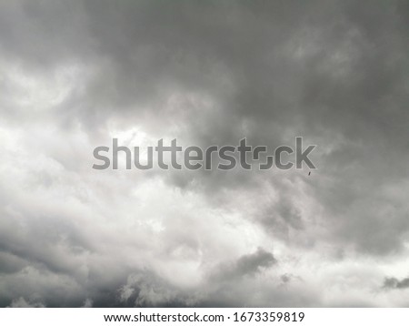 The image of the sky with rain clouds falling.
