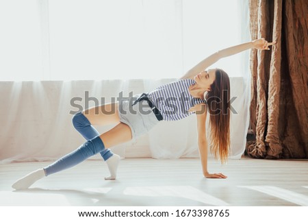 the girl is engaged in fitness and gymnastics