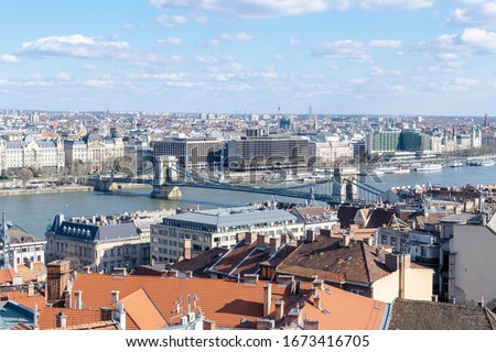 Breath taking panoramic views from above of Budapest skyline over the river Danube, orange rooftops, Chain bridge. Beautiful travel concept background.