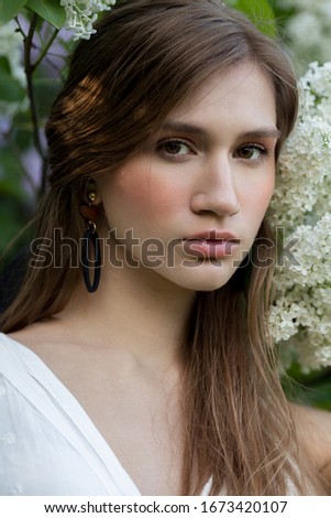 Beautiful young girl in summer fashion look. Close-up summer portrait. Summer concept. 