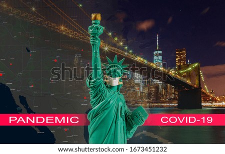 Coronavirus epidemic, word COVID-19 on Brooklyn bridge at dusk, New York City with statue of liberty
