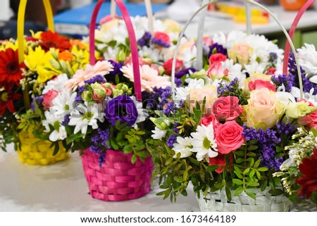 Delivery of flowers and bouquets. Making fresh bouquets. Flower shop inside. The flowers on the table. Exotic beautiful floral compositions