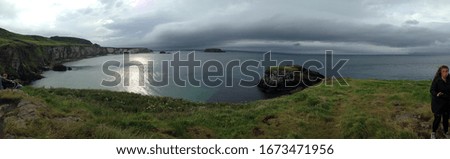 Beautiful pictures of the northern irish coast with the cliffs and ocean painting the background and the lush green scenery ever present 