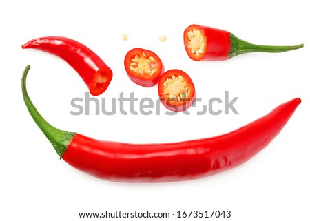 red hot chili peppers with slices isolated on white background. top view