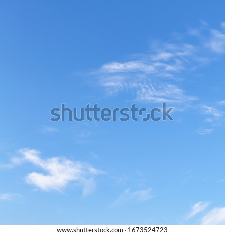 White clouds in blue sky, natural square background photo