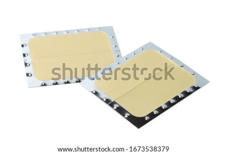Two medical nicotine patches isolated on white Royalty-Free Stock Photo #1673538379