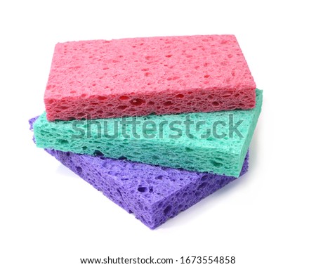 Colorful sponges on white background