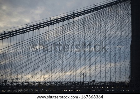 Silhouette of the Brooklyn Bridge at dusk, Manhattan, New York City.