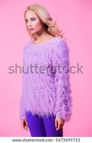 Fashionable bright lady posing in studio. Fashion for women. Pink colors.