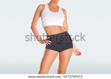 Thermo Clothing. Thermal pants Black shorts underwear for women. Medical Sports orthopedic Shorts. Elongated warming shorts isolated on white background