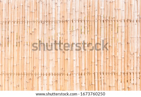 close up decorative old bamboo wood of fence wall  background