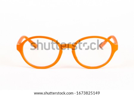 Children's colored glasses on a white background isolated