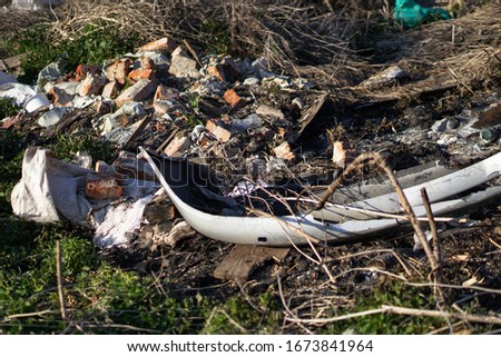 Trash on the nature of abandonment by tourists and vacationers. Ecological catastrophe. Pollution of the planet by people