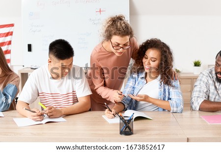 People taking classes at language school Royalty-Free Stock Photo #1673852617