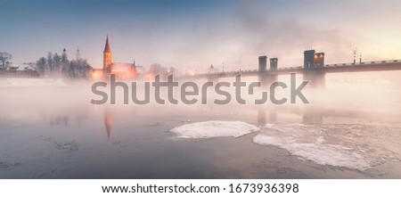 Kaunas is a city in south-central Lithuania. At the confluence of the Neris and Nemunas rivers, Kaunas Castle is a medieval fortress housing historical exhibitions. Royalty-Free Stock Photo #1673936398