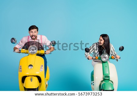 Photo of rushing funny two people lady guy drive retro moped big speed travelers avoiding traffic jam easy way good mood formalwear clothes isolated blue color background