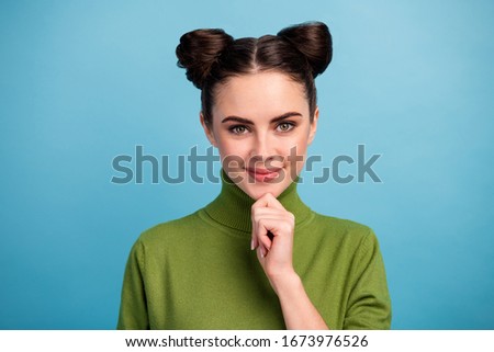 Closeup photo of attractive cute lady look sly eyes think creative idea arm on chin cunning smiling wear warm green turtleneck pullover isolated blue color background
