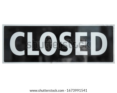 Closed sign a in shop window isolated over white background