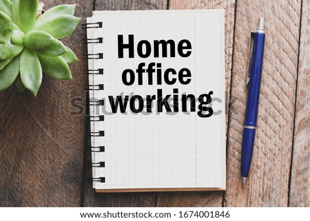 Home office word written on a notebook. Business concept. Time for remote work at home.
