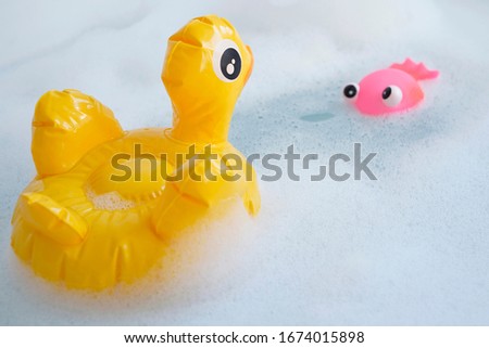  Yellow duck in the water,  inflatable toy, lather               