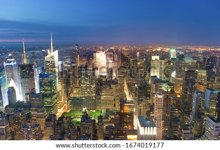 Night aerial view of Midtown Manhattan skyscrapers from a high viewpoint, New York City, USA.