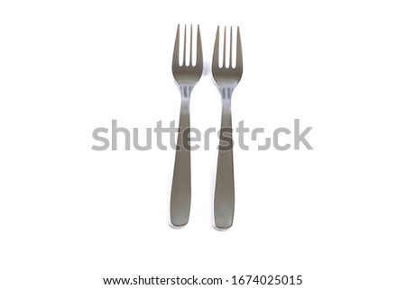Dessert forks on a white background