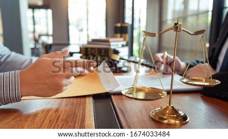 Male Notary lawyer or judge consult or discussing contract papers with Businessman client in office, Law and Legal services concept
