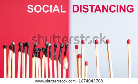 Social Distancing concept using burnt out match sticks as a metaphor for containing corona virus outbreak - health and medical concept image with copy space for text. Royalty-Free Stock Photo #1674043708