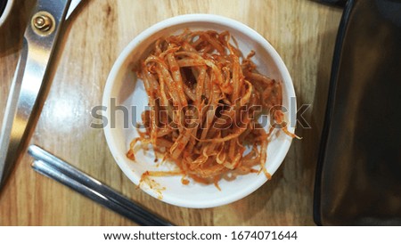                
Bean sprouts stir fry pictures Side dishes for a Korean grilled restaurant Served with an appropriate amount on a white bowl In the illustration with grilling equipment such as plates,