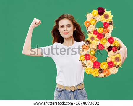 cheerful pretty woman holiday flowers figure eight green background joy
