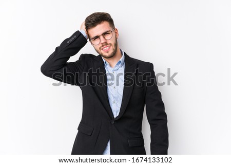 Young caucasian business man posing in a white background isolated Young caucasian business man tired and very sleepy keeping hand on head.