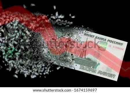 A paper banknote of one thousand Russian rubles dissolves. Russian money fall concept