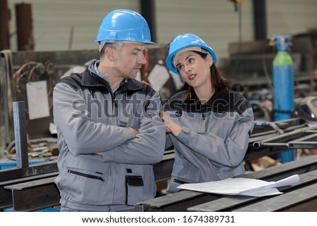 Female worker is trying to help colleague who is upset