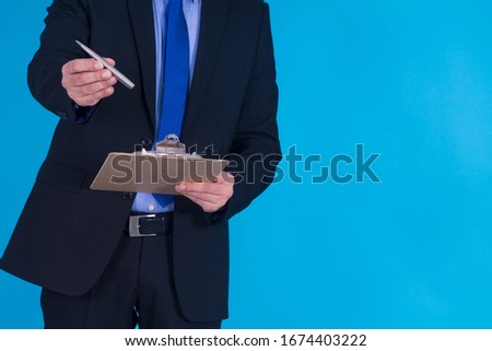 businessman with documents to sign