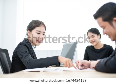 Young Asian woman working job loan money banking online for help advice customer man and wife sign agreement contract, She using laptop computer