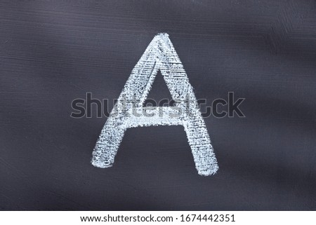 Letter A of the alphabet written with chalk