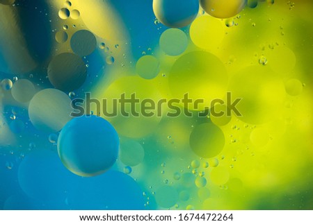 abstract background, drops of oil on water, bubbles, space fantasy, color gradient, color circles of oil on a water surface


