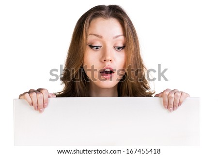 Close up business woman portrait. White background female portrait. Surprised girl hold white blank card.