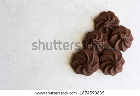 Brownie chocolate chip cookies on gray background with copy space, flat lay