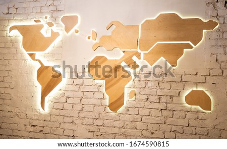 World map on brick wall - loft interior