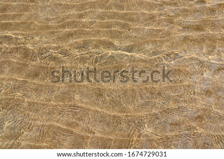 Beach surface in the sea. Sand beach background. Sand wave under the sea. underwater with sandy sea bottom.
