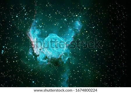 Space nebula of blue color. Elements of this image were furnished by NASA. For any purpose.