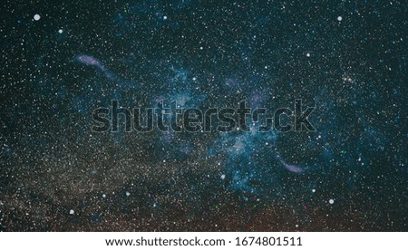 Chaotic space background. Planets, stars and galaxies in outer space showing the beauty of space exploration. The elements of this image furnished by NASA.